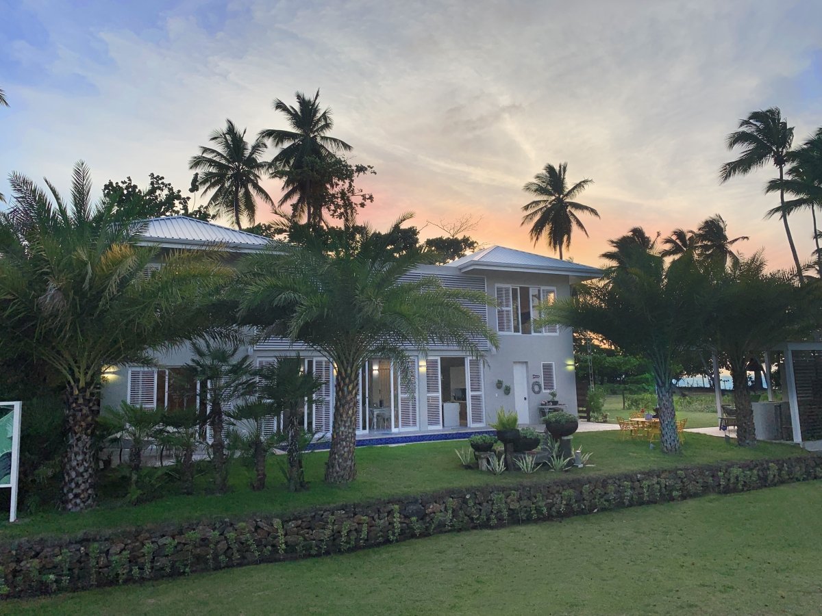 The Guest House beachfront villa at sunset