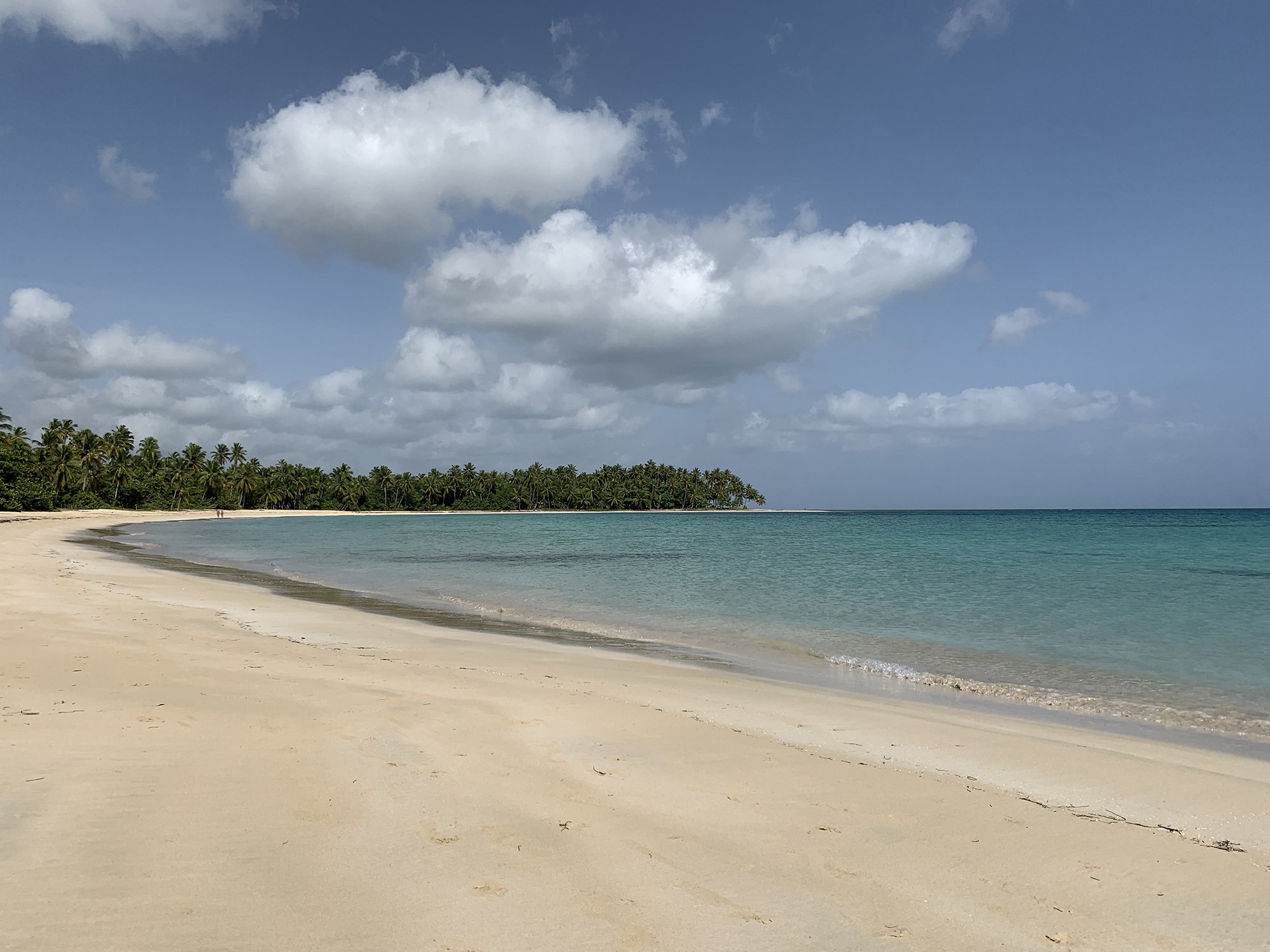 Turquoise water and quiet beach near The Guest House